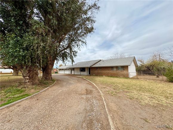 1713 E Cottonwood Lane Mohave Valley, AZ House Active - Photo 1 of 67. Opens carousel modal