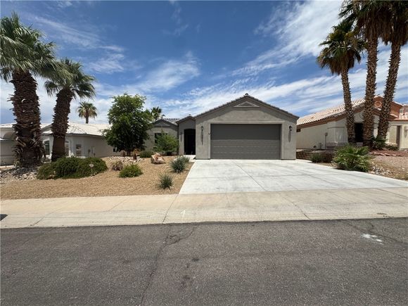 2933 Camino Encanto Bullhead City, AZ House Active - Photo 1 of 33. Opens carousel modal