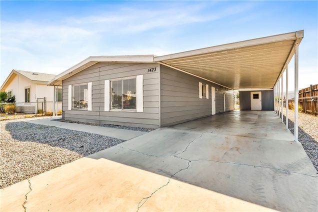 1423 Tonto Drive Bullhead City, AZ House Active - Photo 1 of 48. Opens carousel modal