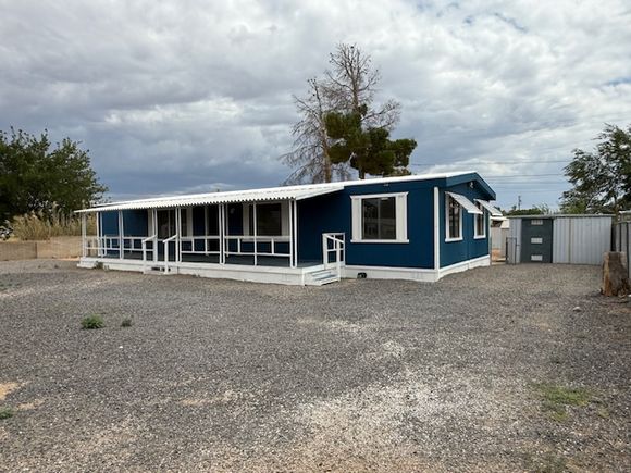 3060 E Thompson Avenue Kingman, AZ House Active - Photo 1 of 25. Opens carousel modal