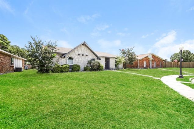 8910 Miami Drive Rowlett, TX House Active - Photo 1 of 15. Opens carousel modal