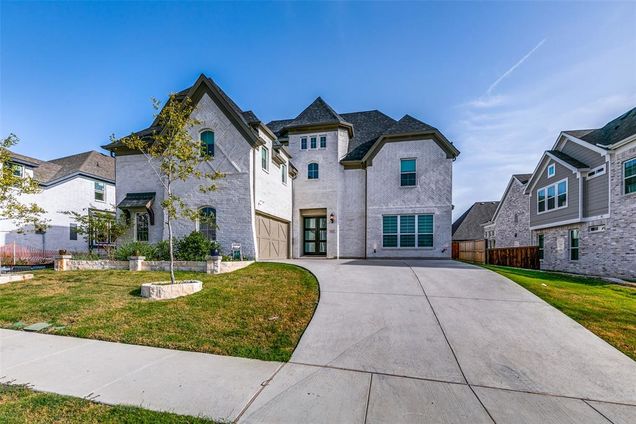 1021 Cascading Creek Drive Rockwall, TX House Active - Photo 1 of 34. Opens carousel modal