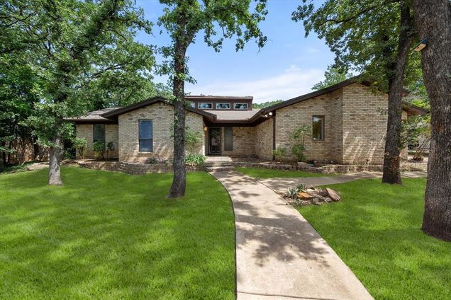2809 Burlwood Drive Dalworthington Gardens, TX House Active - Photo 1 of 34. Opens carousel modal
