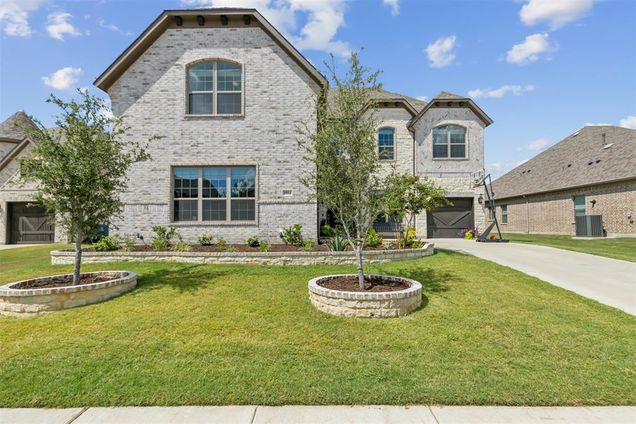 1014 Ember Crest Drive Rockwall, TX House Active - Photo 1 of 37. Opens carousel modal