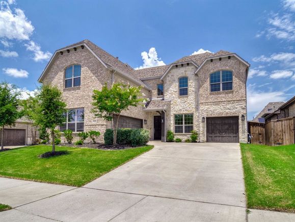 908 Hunters Creek Drive Rockwall, TX House Active - Photo 1 of 40. Opens carousel modal