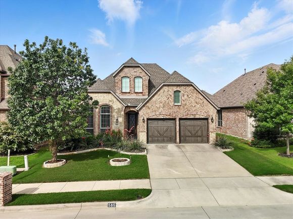 585 Mountcastle Drive Rockwall, TX House Active - Photo 1 of 40. Opens carousel modal