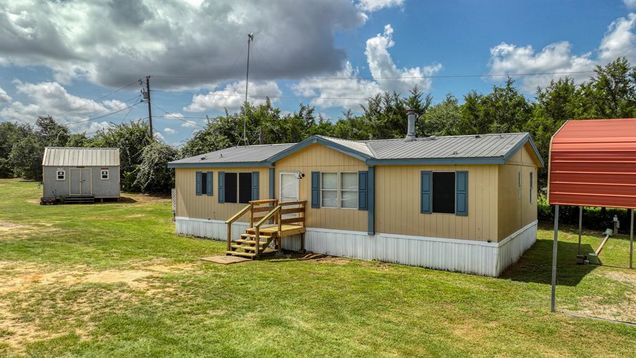 221 Briar Oaks Drive Azle, TX House Active - Photo 1 of 40. Opens carousel modal