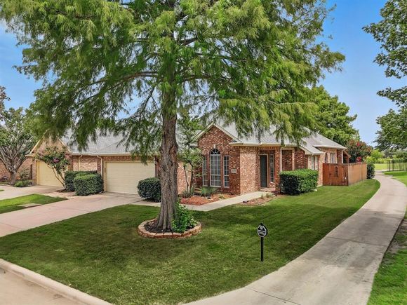8909 Edinburgh Lane Rowlett, TX House Active - Photo 1 of 37. Opens carousel modal