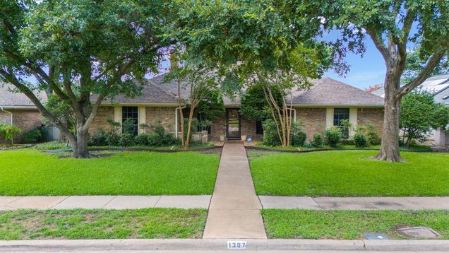 1307 Rusk Drive Richardson, TX House Active - Photo 1 of 32. Opens carousel modal