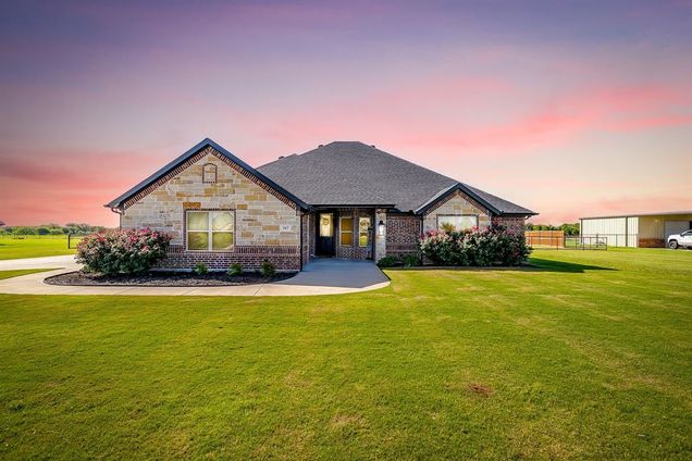 317 Olde Knoll Place Rio Vista, TX House Active - Photo 1 of 31. Opens carousel modal