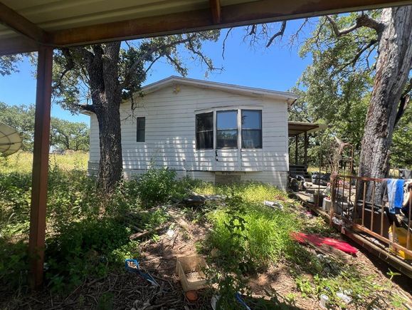 324 Whispering Oaks Mineral Wells, TX House Active - Photo 1 of 40. Opens carousel modal