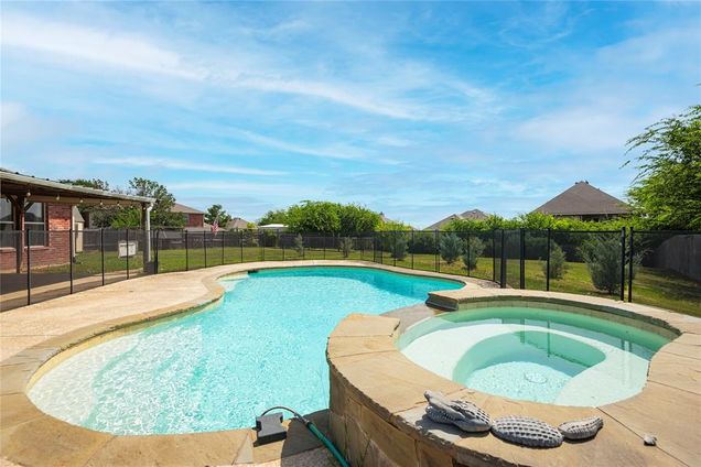 905 Hillside Circle Justin, TX House Active - Photo 1 of 32. Opens carousel modal