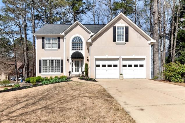 2002 Stonewick Court Lawrenceville, GA House Pending - Photo 1 of 65. Opens carousel modal