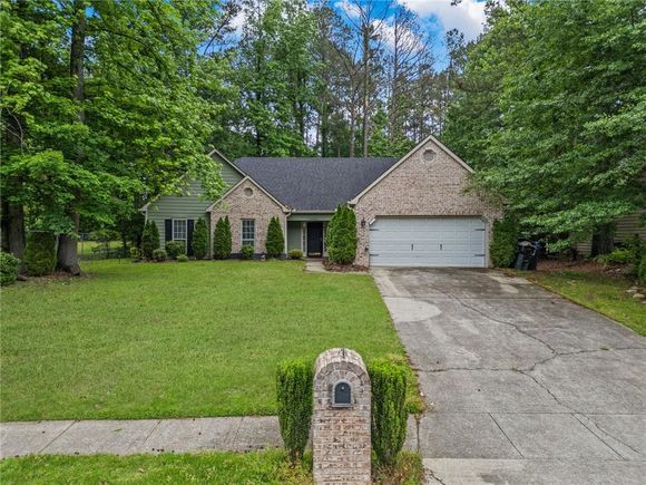 1642 Ashmar Lane SW Marietta, GA House Pending - Photo 1 of 33. Opens carousel modal