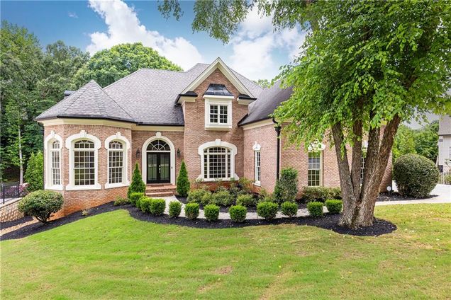 9360 Nesbit Lakes Drive Alpharetta, GA House Active - Photo 1 of 74. Opens carousel modal