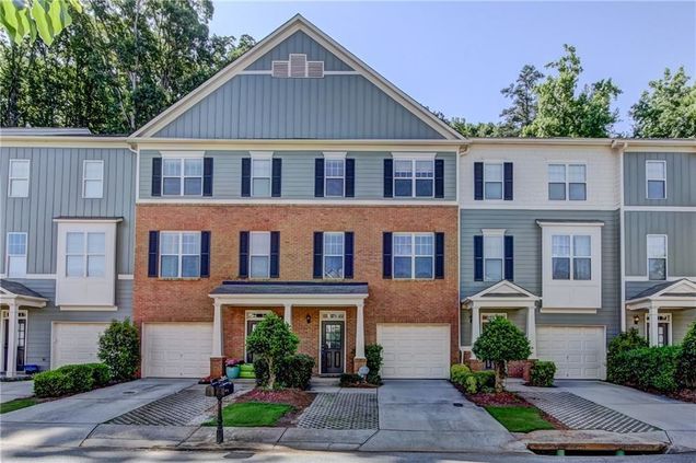 1754 Oakbrook Lane NW Kennesaw, GA Townhouse Active - Photo 1 of 44. Opens carousel modal