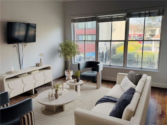 384 Ralph Mcgill Boulevard NE Unit 121 Atlanta, GA Condo Active - Photo 1 of 37. Opens carousel modal