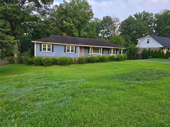 1116 Arden Drive SW Marietta, GA House Active - Photo 1 of 12. Opens carousel modal
