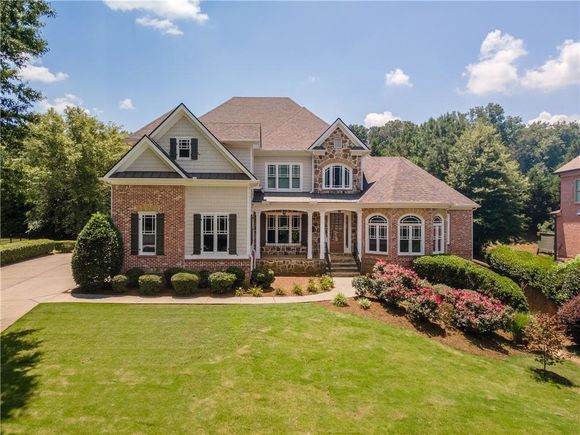 4035 Preserve Crossing Lane Cumming, GA House Active - Photo 1 of 93. Opens carousel modal