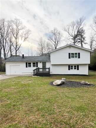 1570 Woodcreek Drive Cumming, GA House Active - Photo 1 of 22. Opens carousel modal