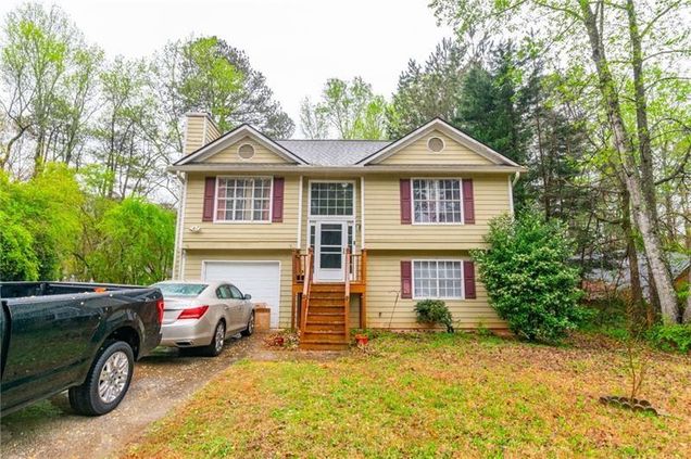 990 Fox Valley Trail Stone Mountain, GA House Active - Photo 1 of 23. Opens carousel modal