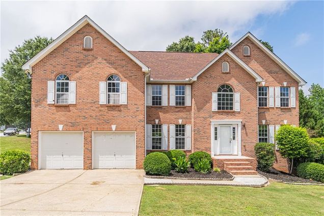 1241 Hogan Ridge Court Grayson, GA House Active - Photo 1 of 56. Opens carousel modal