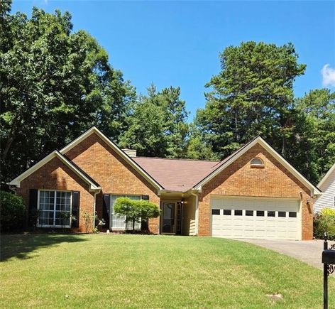 1582 Longwood Drive Lawrenceville, GA House Active - Photo 1 of 42. Opens carousel modal