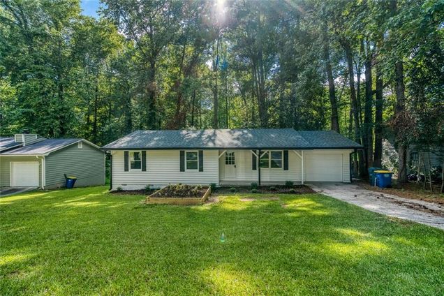 4070 Woodland Drive NW Kennesaw, GA House Active - Photo 1 of 32. Opens carousel modal