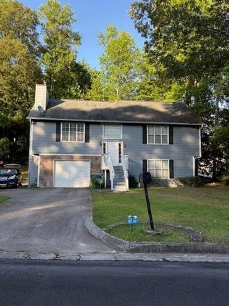 1015 Sly Fox Court Stone Mountain, GA House Active - Photo 1 of 4. Opens carousel modal