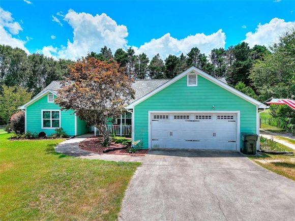1063 Carter Drive Loganville, GA House Pending - Photo 1 of 34. Opens carousel modal