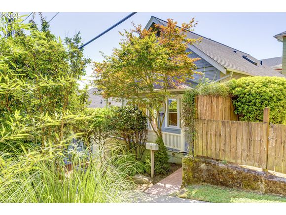 12 S Lowell St Portland, OR House Active - Photo 1 of 44. Opens carousel modal