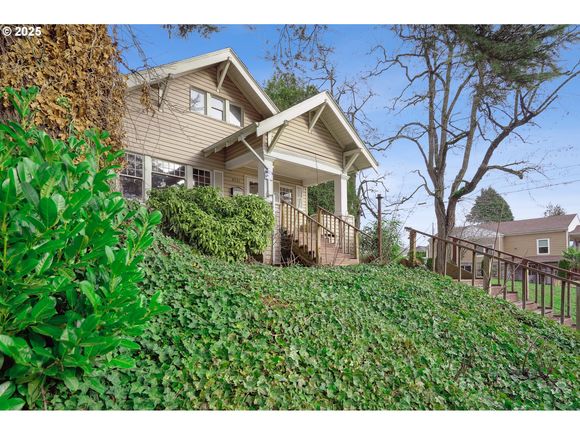 8921 SE Washington St Portland, OR House Active - Photo 1 of 40. Opens carousel modal