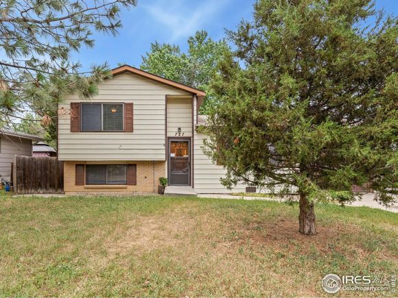727 Mount Evans St Longmont, CO House Active - Photo 1 of 15. Opens carousel modal