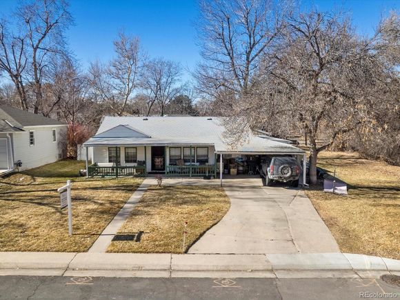 3145 S Ash St Denver, CO House Active - Photo 1 of 24. Opens carousel modal