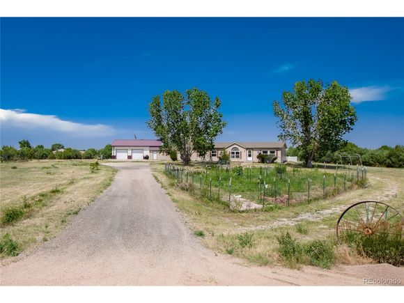 7085 County Road I Wiggins, CO House Active - Photo 1 of 50. Opens carousel modal