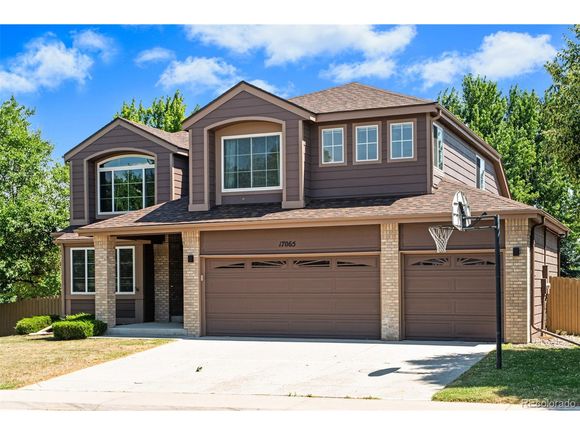 17065 Wellington Dr Parker, CO House Active - Photo 1 of 48. Opens carousel modal