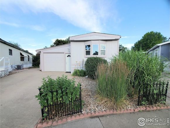1166 Madison Ave Unit 71 Loveland, CO House Active - Photo 1 of 14. Opens carousel modal