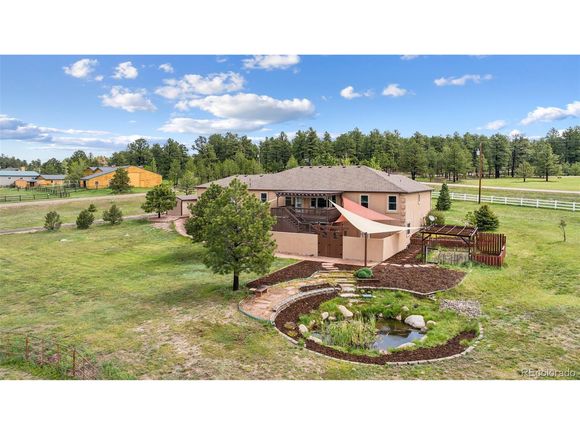 7755 Pine Cone Rd Colorado Springs, CO House Active - Photo 1 of 50. Opens carousel modal