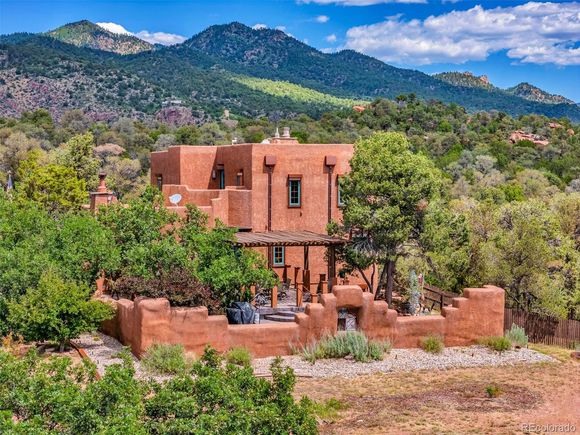 15660 Rancho Pavo Dr Colorado Springs, CO House Active - Photo 1 of 50. Opens carousel modal