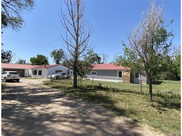 12729 Desert Dr Sterling, CO House Active - Photo 1 of 34. Opens carousel modal