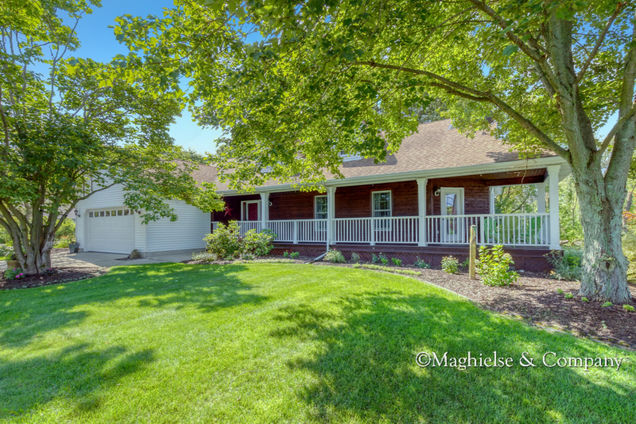 9101 Walnut Grove Drive NE Rockford, MI House Sold - Photo 1 of 55. Opens carousel modal