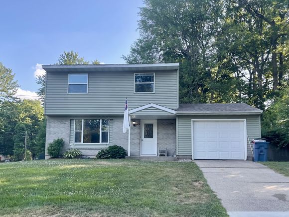 4869 Kittery Drive NW Comstock Park, MI House Active - Photo 1 of 40. Opens carousel modal