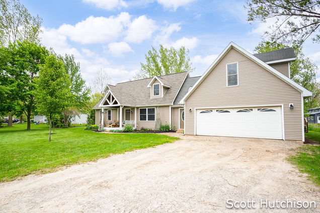 9953 10 Mile Road NE Rockford, MI House Active - Photo 1 of 58. Opens carousel modal