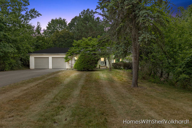 303 4 Mile Road NW Comstock Park, MI House Active - Photo 1 of 53. Opens carousel modal