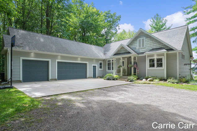 12185 Hart Street NE Greenville, MI House Active - Photo 1 of 50. Opens carousel modal