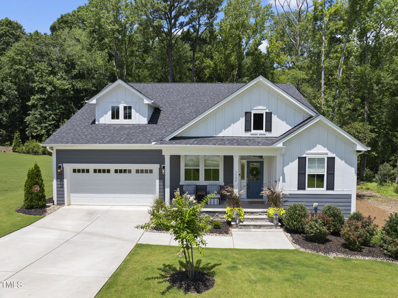 1524 Commons Ford Place Apex, NC House Active - Photo 1 of 44. Opens carousel modal