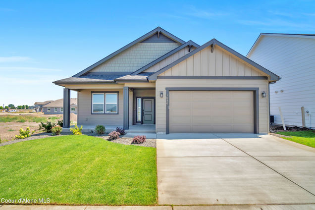 1680 W Alsea Loop Post Falls, ID House Active - Photo 1 of 33. Opens carousel modal