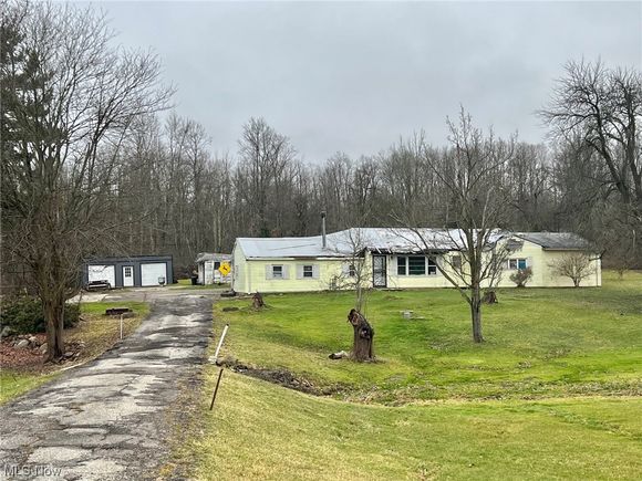 14349 Mayfield Road Huntsburg, OH House Sold - Photo 1 of 16. Opens carousel modal