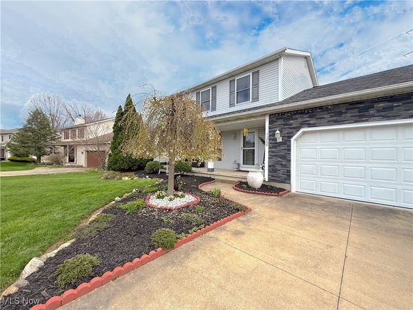 1208 Grovewood Drive Tallmadge, OH House Sold - Photo 1 of 31. Opens carousel modal