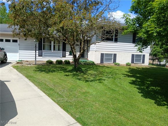 8565 Greenleaf Circle NW Canal Fulton, OH House Sold - Photo 1 of 13. Opens carousel modal